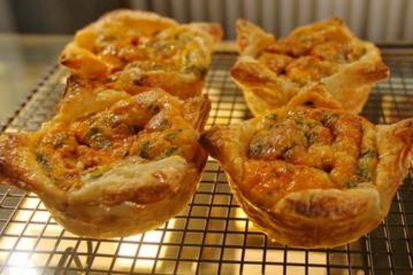 Egg, bacon, onion and tomato pastries.