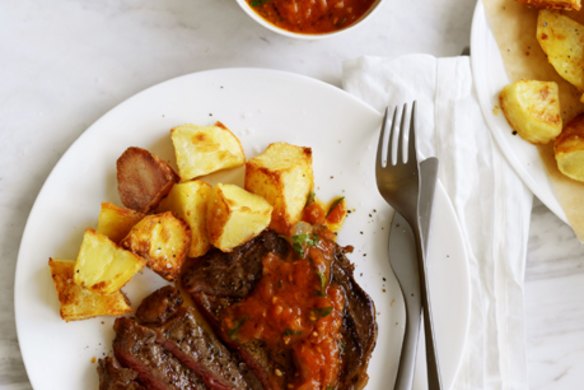 Grilled aged rib-eye with tomato, onion and chipotle salsa