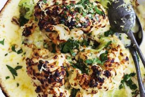 Whole cauliflower gratin with pickled celery and walnuts