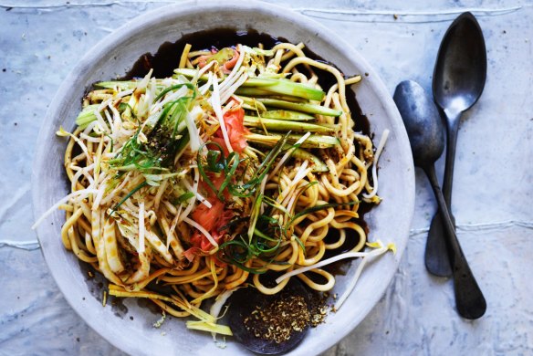 Cool noodles, cabbage and cucumber sprinkled with spicy Sichuan pepper.