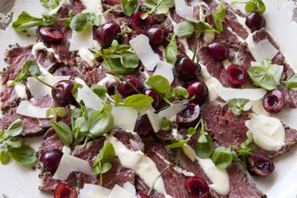 Beef carpaccio with horseradish cream, remoulade and pickled cherries.