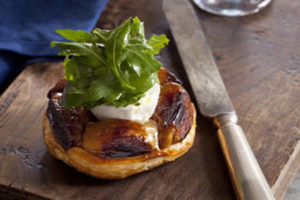 Caramelised shallot tart with goat's cheese & rocket. Recipes to celebrate 20 YEARS OF JEREMY BEING IN AUSTRALIA for Epicure and Good Living, by Jane and Jeremy Strode. Photographed by Marina Oliphant. Styling by Mags King. Merchandising by Berni Smithies. The Age Newspaper and The Sydney Morning Herald. Photographed February 20, 2012.