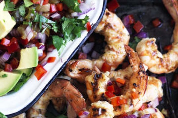 Yucatan-style grilled king prawns with avocado jalapeno salsa.