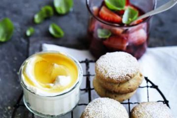 Poached strawberries, honey, labneh and spiced biscuits.