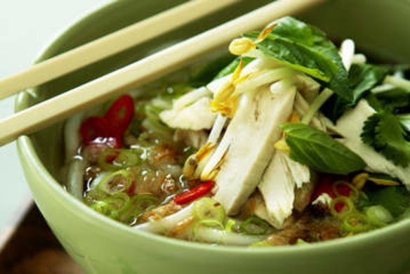 Fragrant chicken and rice noodle soup.