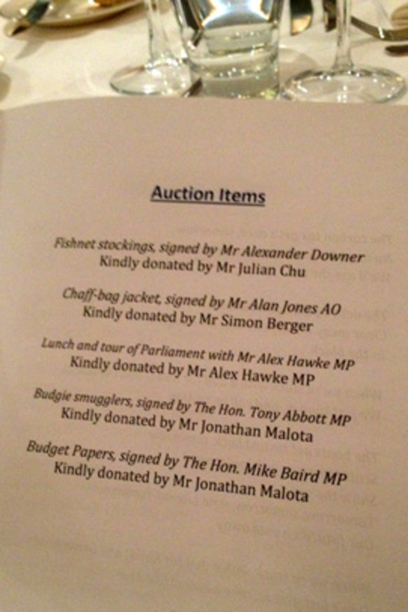 For sale ... the auction items sold at the Young Liberals dinner, including the chaff-bag jacket, signed by Alan Jones.