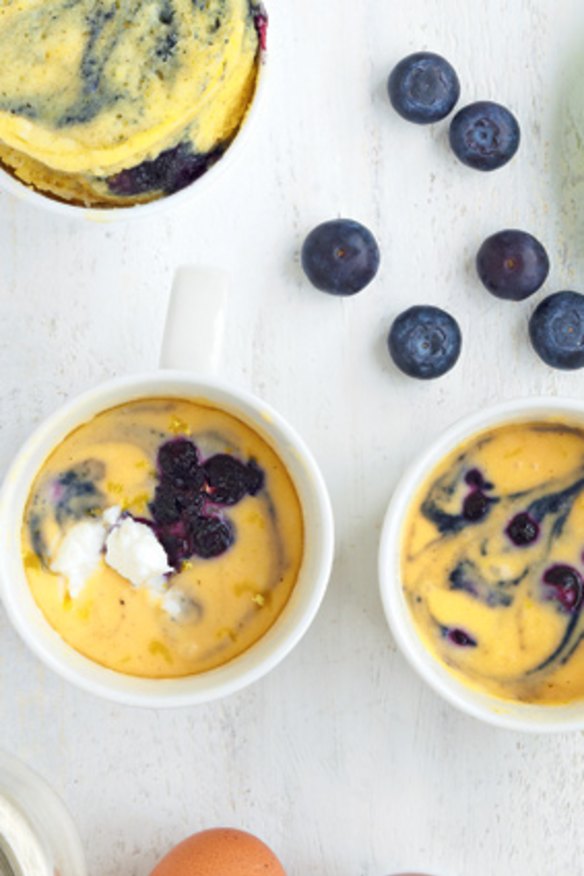 Ricotta-blueberry mug cake before and after (top left) cooking.