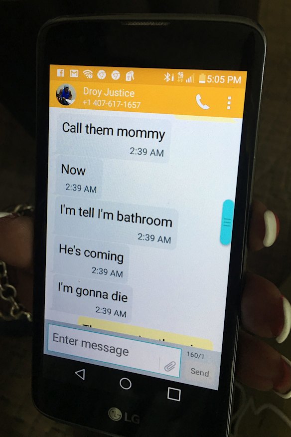 Mina Justice shows a text message she received from her son Eddie Justice.