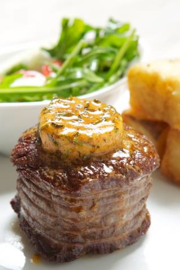Steak with cafe de Paris herbed sauce features on the easy-please menu at Six Keys.