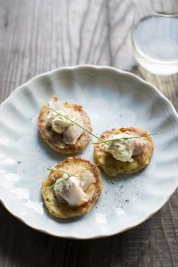 Grilled trout on potato cakes with creme fraiche.