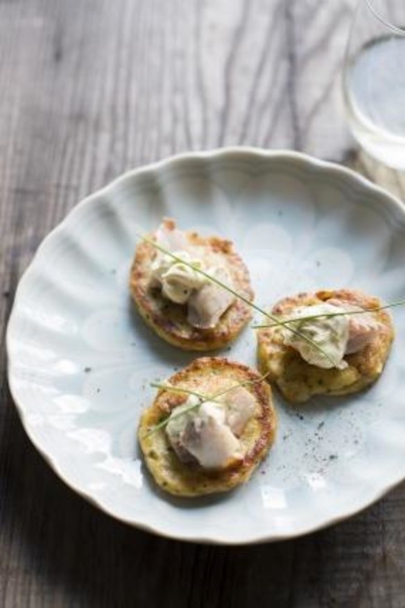 Grilled trout on potato cakes with creme fraiche.