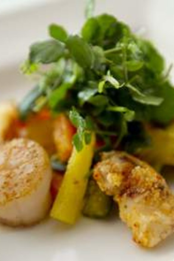 Marinated scallops and calamari with vegetable achar and watercress at the Lanterne Rooms.