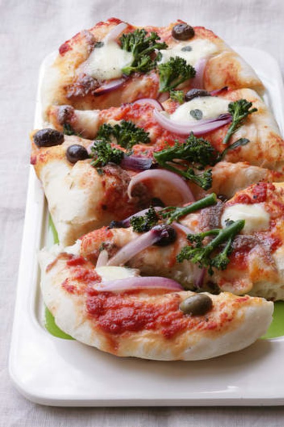Pizza with broccolini, mozzarella and anchovy.