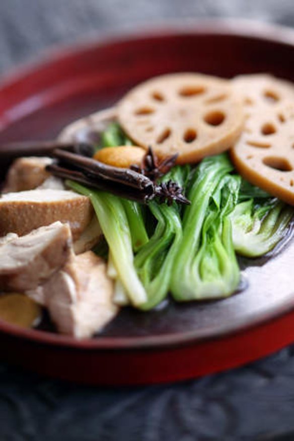 Soy-braised chicken with bok choy and lotus root.