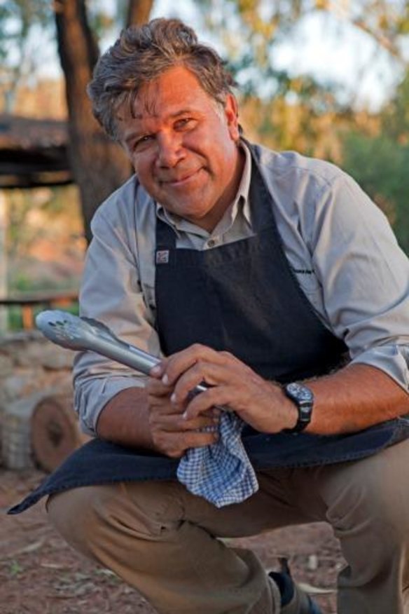 Bob Taylor at work in his open desert kitchen in Alice Springs.