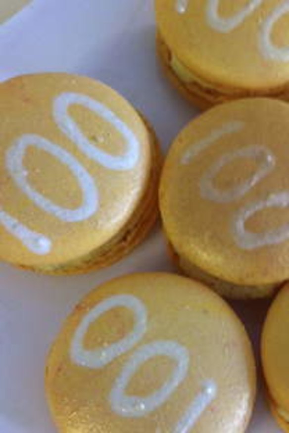 Dream Cuisine gold macarons with lemon myrtle for the centenary.