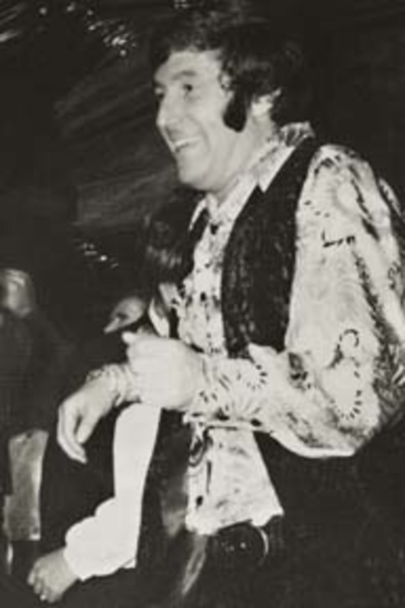 A performer from the musical <i>Hair</i> with Harry M. Miller at an event for the society during the swinging '60s.