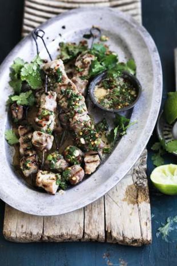 Sticky pork skewers with spiced lime dipping sauce.