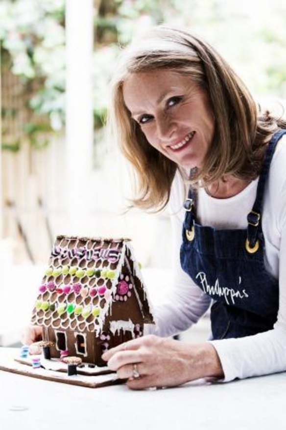 Phillippa Grogan and her traditional gingerbread house.