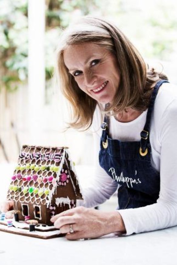 Phillippa Grogan and her traditional gingerbread house.