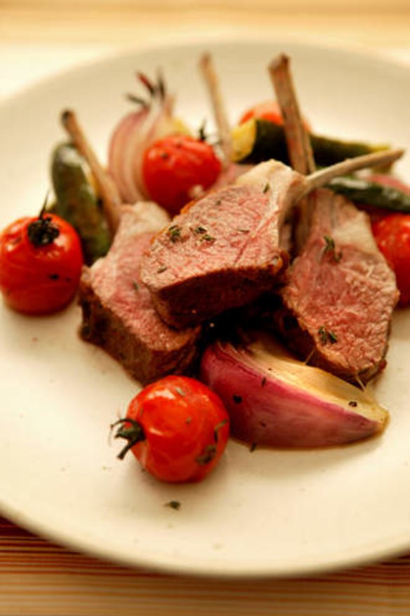 Rack of lamb with roasted tomatoes and bearnaise sauce.