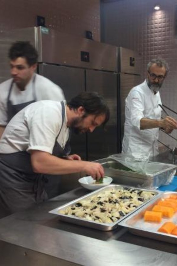 Rene Redzepi and Massimo Bottura at work.