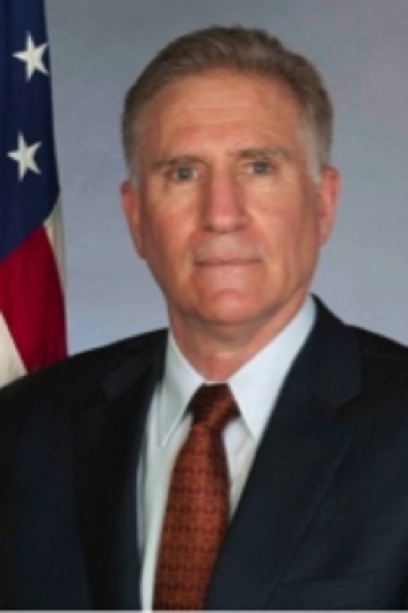 Charges d'affaires Jim Carouso