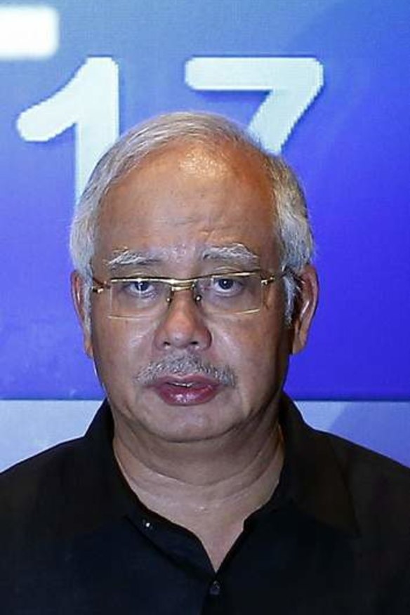 Malaysian prime minister Najib Razak addresses reporters in Kuala Lumpur.