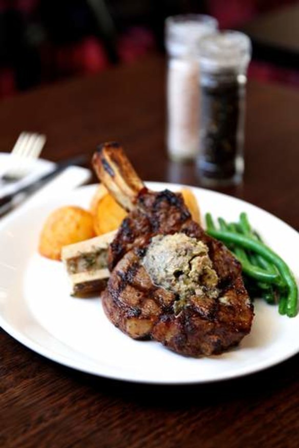 Juicy delight: Rib-eye on the bone from the Bar & Grill at The Oaks Hotel in Neutral Bay.