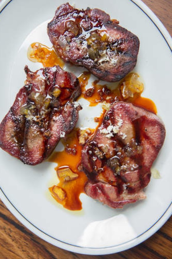 Thick slabs of grilled ox tongue.