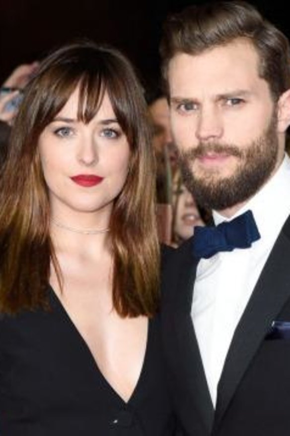 Dakota Johnson and Jamie Dornan at the <i>Fifty Shades of Grey</i> premiere in Berlin.