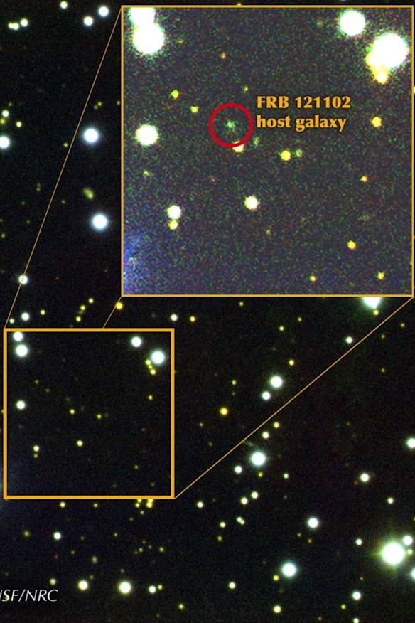 A composite image of the field around FRB 121102. The dwarf galaxy from which the fast radio bursts originate is a barely visible green dot.