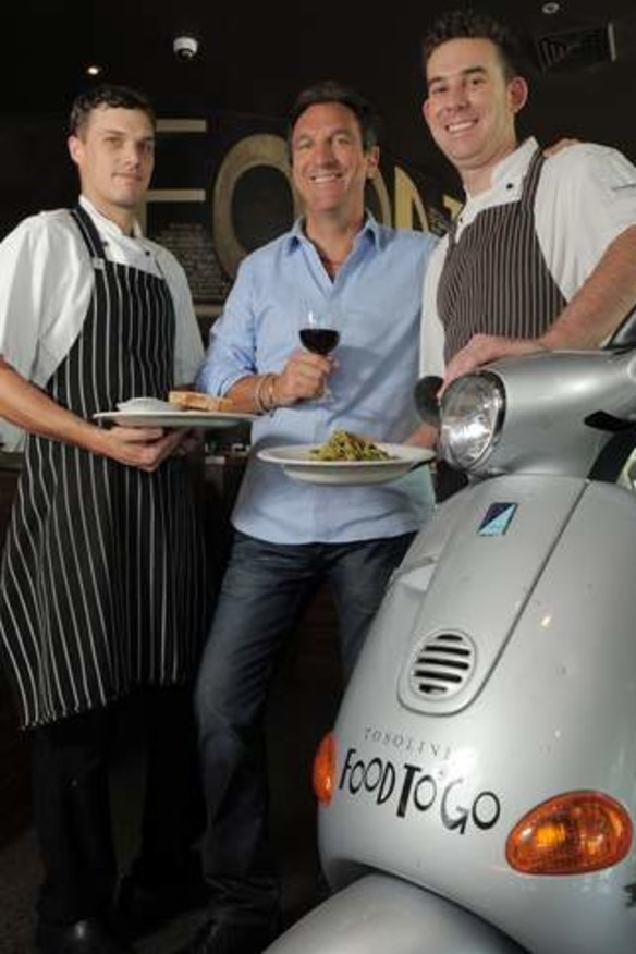 Carlo Tosolini, centre, with assistant chef Scott Douglas, left, and head chef, Peter Spencer, right.
