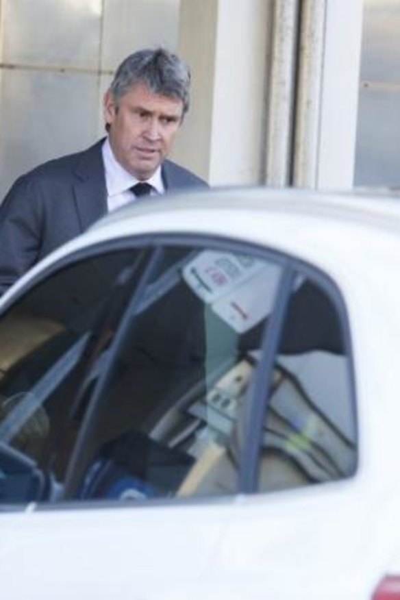 David Gyngell leaves Packer's home on Monday morning.