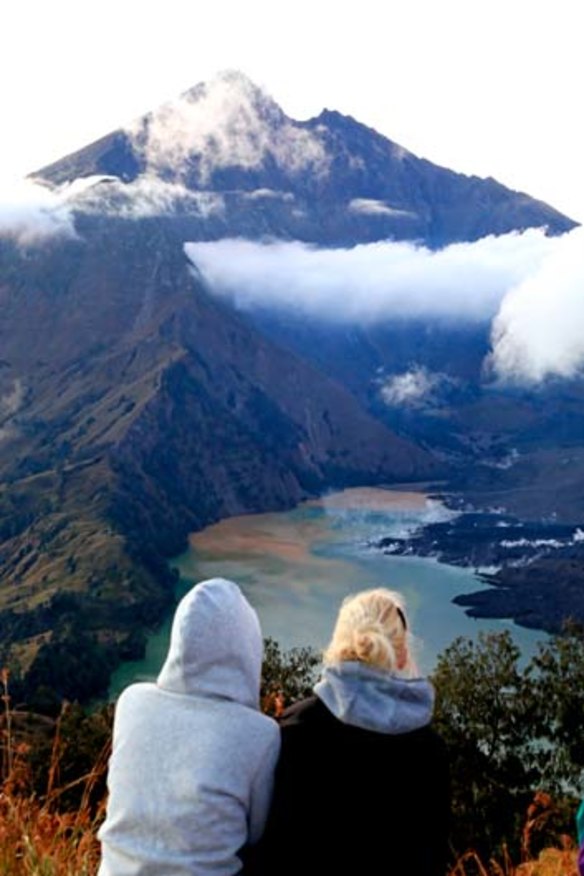Peak practice ... trekkers enjoy the view of Mount Rinjani.