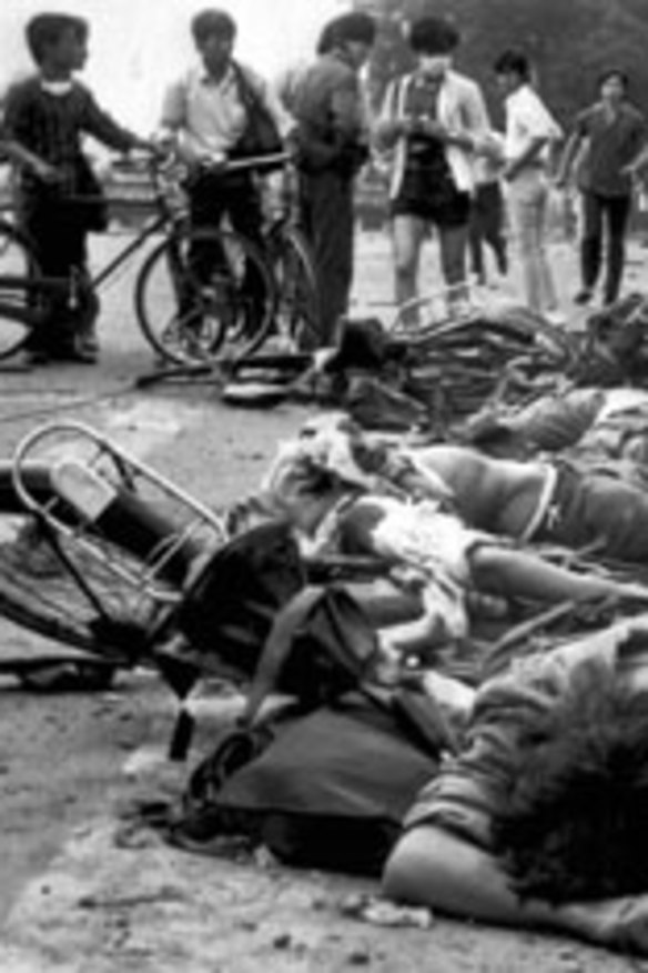 The bodies of dead civilians lie among mangled bicycles near Tiananmen Square on June 4, 1989.