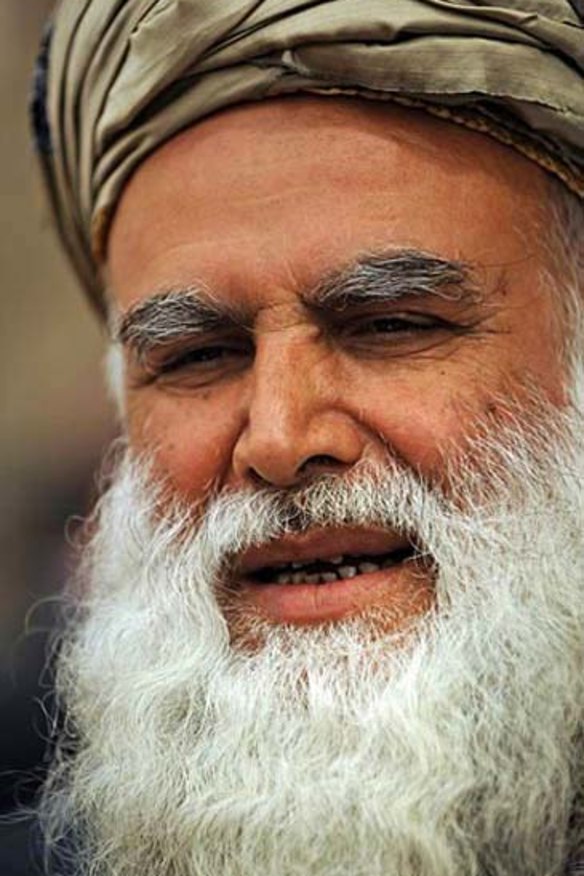 Karzai backs infamous warlord to be speaker