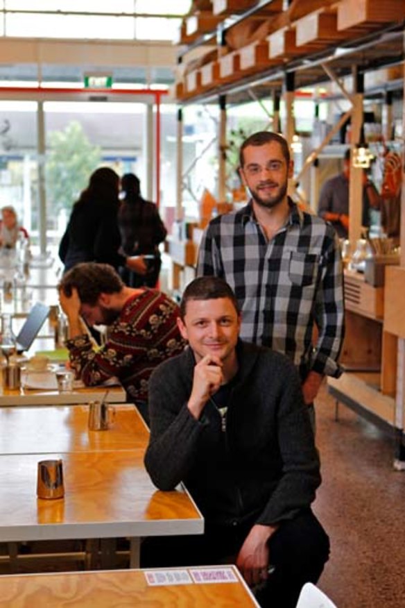 Chasing the bean: Co-owners Andy Gelman and Dean Atkins (seated) of cafe Omar and the Marvellous Coffee Bird in Gardenvale.