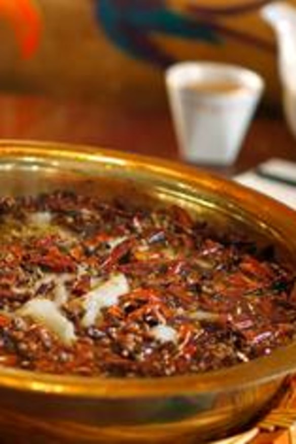 Boiling fish in golden basin from Dainty Sichuan Chinese restaurant in south Yarra.