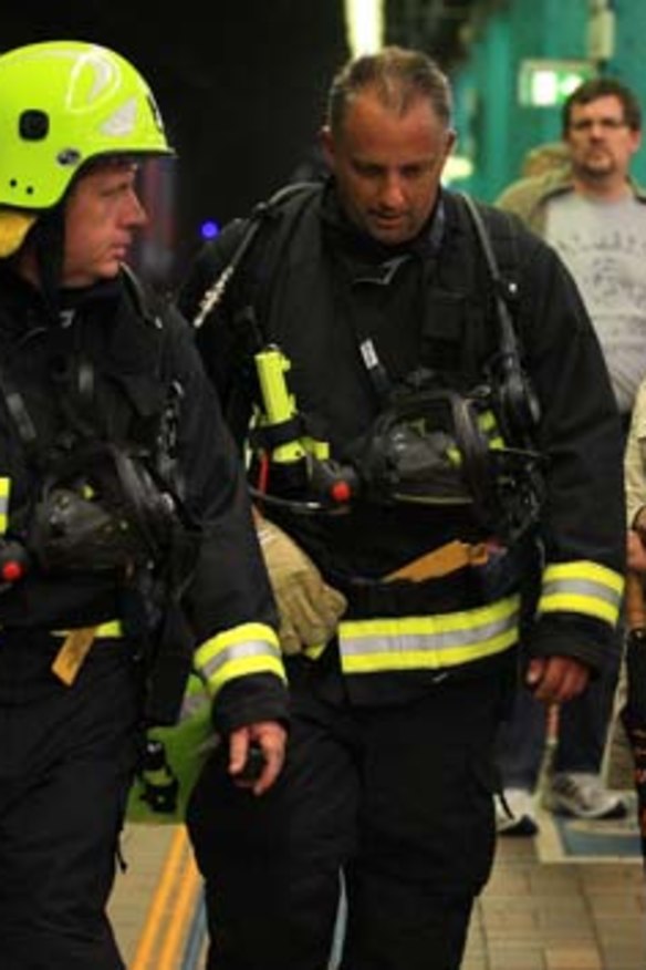 Emergency workers at Wynard station last week after a cable short-circuited and sent smoke into the station.