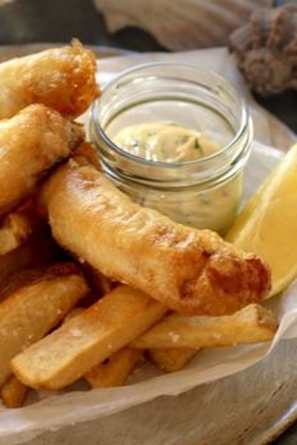 Fish and chips with tartare sauce.
