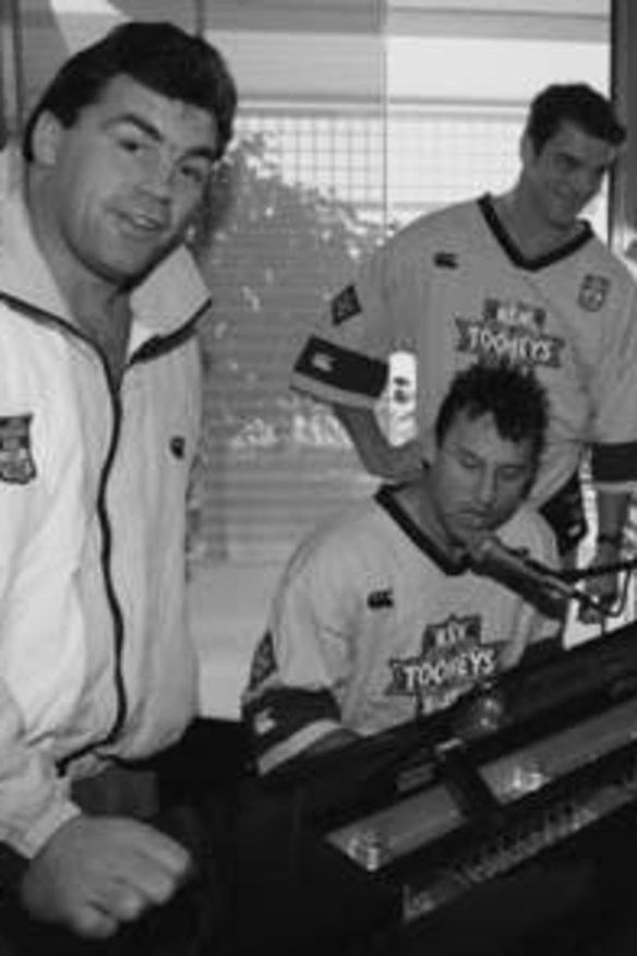 Origin flashback 1994: The little-known band of Laurie Daley & the Cockroaches belt out their hit song "The Premier State" with David Gillespie, Ian Roberts, Brad Mackay and Paul Sironen on backing vocals. What sort of music did they sing? Blues, of course.