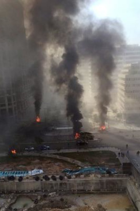 Shattered: Palls of smoke rise from the scene of the attack, which occurred in a part of downtown Beirut some Lebanese saw as a symbol of the country's rebirth.