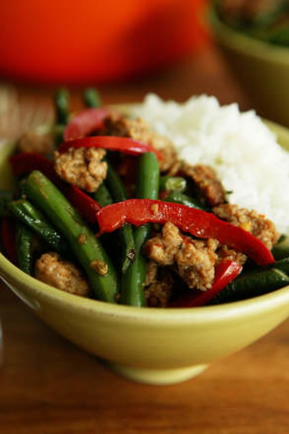 Wok-fried green beans with chilli pork, served with rice.
