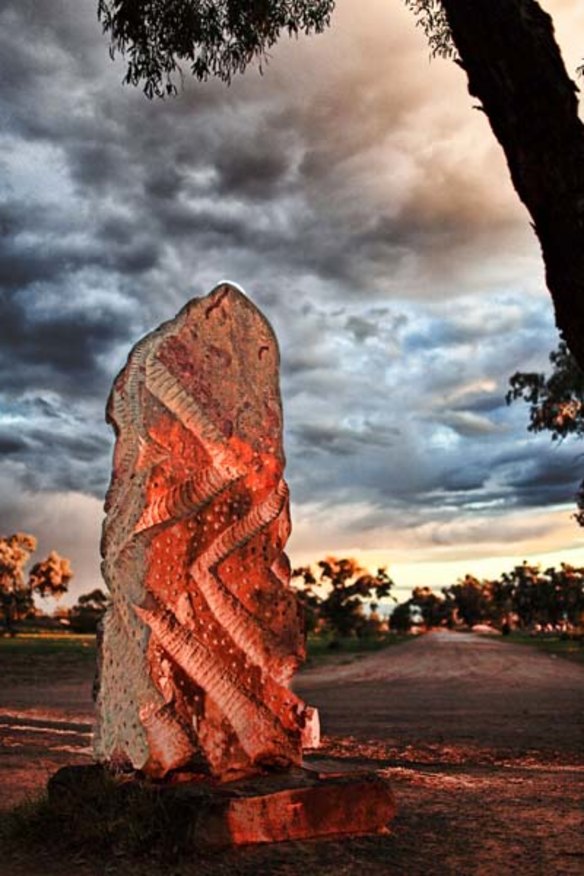 In memorium ... the grave of eye surgeon Fred Hollows is marked by a sculpted monument.