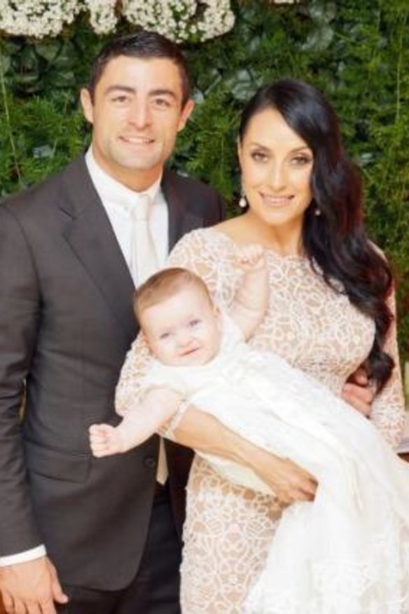Pure joy: Terry Biviano, Anthony Minichiello and baby Azura on her christening day.