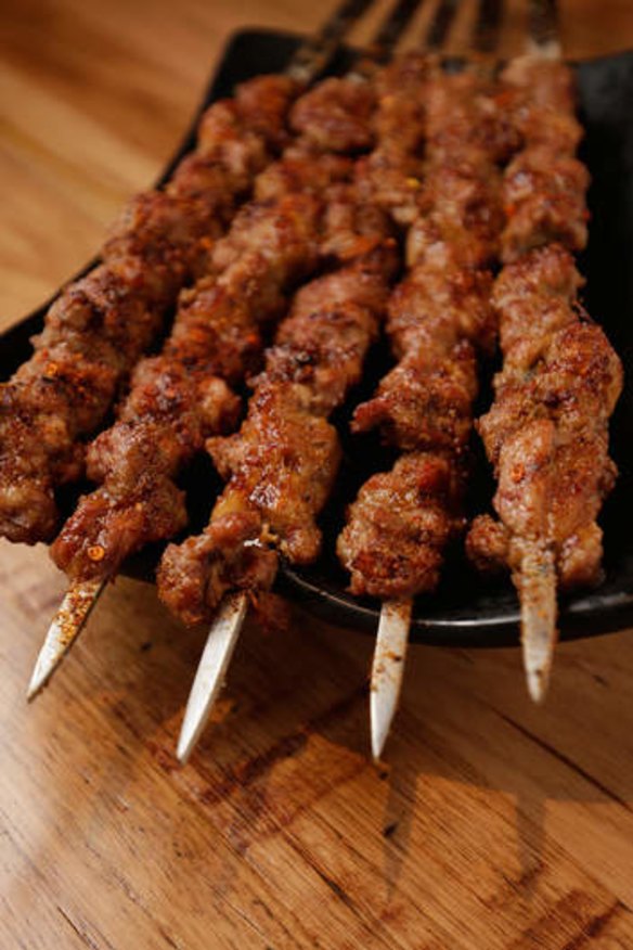 Sword-like lamb skewers.