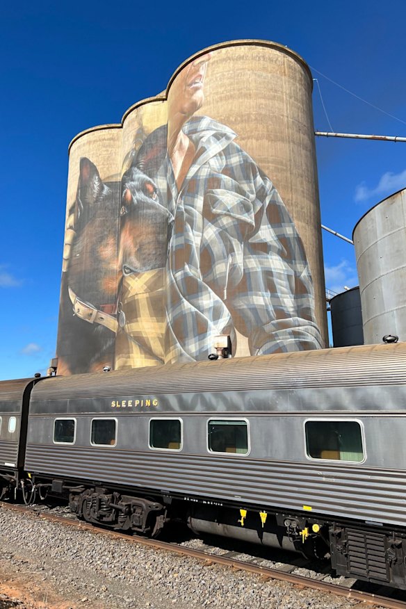 Smug's work in Nullawil depicts a local farmer in checked shirt with his loyal kelpie next to him.