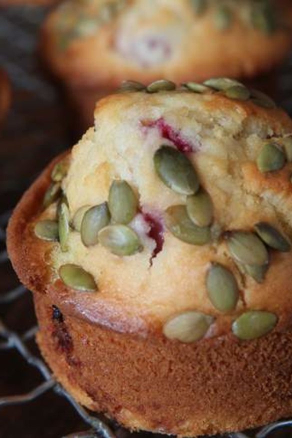 Strawberry and white chocolate muffins with pepitas.