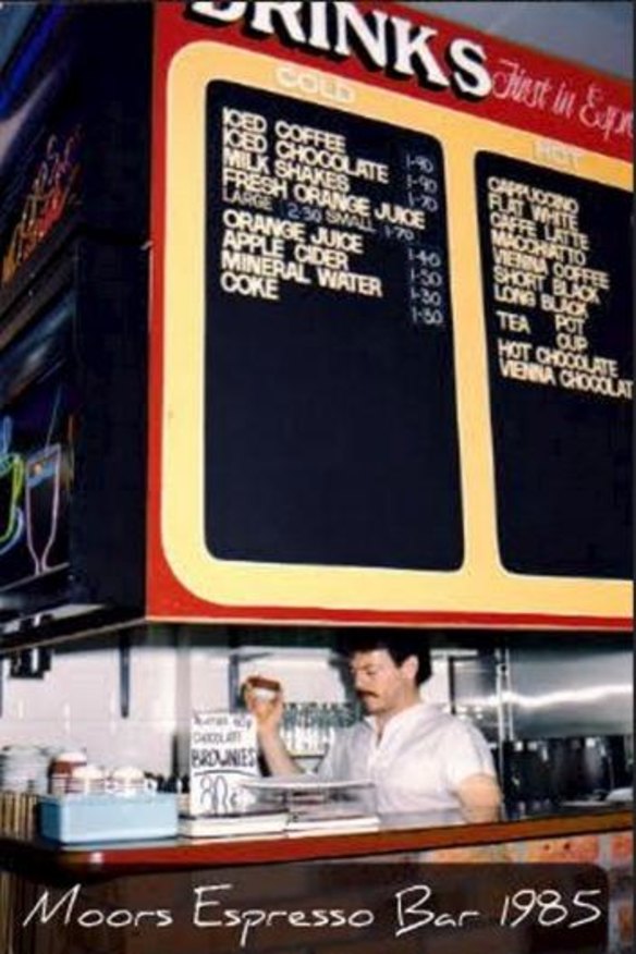 The smoking gun: the menu board showing the flat white.